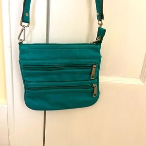 Teal cross body bag. Liz Claiborne. Excellent condition. Multiple pockets